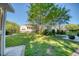 Spacious backyard showcasing a well-manicured lawn and mature trees surrounding the house at 3751 St Ellens Dr, Mount Pleasant, SC 29466