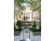 Scenic backyard with a water fountain, manicured shrubs, and an inviting patio area for relaxation at 3751 St Ellens Dr, Mount Pleasant, SC 29466