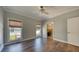 Comfortable bedroom offers natural light, hardwood floors, and a view to the backyard at 3751 St Ellens Dr, Mount Pleasant, SC 29466