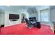 Finished bonus room with built-in shelving, carpeting, and ample space for a home office at 3751 St Ellens Dr, Mount Pleasant, SC 29466