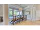 The dining room has travertine floors, a large table with seating for ten, and a decorative chandelier at 3751 St Ellens Dr, Mount Pleasant, SC 29466