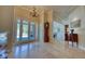 View of the foyer featuring tile floors and a glass-paneled front door with antique furnishings at 3751 St Ellens Dr, Mount Pleasant, SC 29466