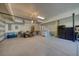 Spacious three car garage with storage, work area, and a staircase leading to the second level at 3751 St Ellens Dr, Mount Pleasant, SC 29466