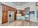 Spacious kitchen with two-tone cabinets, stainless steel appliances, and hardwood floors at 3751 St Ellens Dr, Mount Pleasant, SC 29466