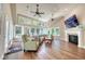 Bright living room with vaulted ceilings, hardwood floors, and a fireplace at 3751 St Ellens Dr, Mount Pleasant, SC 29466