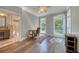 Bright office space featuring wood floors, ample natural light, and convenient bathroom access at 3751 St Ellens Dr, Mount Pleasant, SC 29466