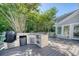 Well-equipped outdoor kitchen on the deck with a built-in grill and ample counter space perfect for entertaining at 3751 St Ellens Dr, Mount Pleasant, SC 29466