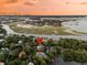 Waterfront neighborhood with winding rivers and stunning homes nestled among lush trees at 401 Ralston Creek St, Charleston, SC 29492
