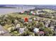 Aerial view of property near waterfront with expansive views and mature trees at 401 Ralston Creek St, Charleston, SC 29492