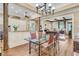 The open dining room features stylish seating and seamless integration with the gourmet kitchen at 401 Ralston Creek St, Charleston, SC 29492