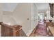 Hallway with hardwood floors, white closets, and rug, showcasing the home's design at 401 Ralston Creek St, Charleston, SC 29492