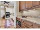 Bright eat-in kitchen with custom cabinets, wood floors, and stainless steel appliances at 401 Ralston Creek St, Charleston, SC 29492