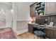Charming home office with custom built-ins and a desk area with lots of light at 401 Ralston Creek St, Charleston, SC 29492