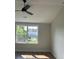 Bright bedroom featuring a ceiling fan and large window with natural light at 4126 O'Hear Ave, North Charleston, SC 29406