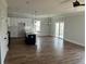 Open-concept living area featuring a ceiling fan, dining area, and kitchen with stainless appliances at 4126 O'Hear Ave, North Charleston, SC 29406