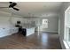 Well-lit open floorplan joining the modern kitchen and spacious living area at 4126 O'Hear Ave, North Charleston, SC 29406