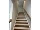 Carpeted stairs with painted risers and wooden handrail at 4126 O'Hear Ave, North Charleston, SC 29406