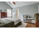 Inviting bedroom features a high ceiling, ample natural light, and a TV for relaxing evenings at 419 Equinox Cir, Ladson, SC 29456