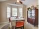 Bright dining room with a charming display case and beautiful windows allowing for plenty of natural light at 419 Equinox Cir, Ladson, SC 29456