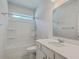 Bathroom with tub and shower combination, framed mirror and vanity with storage underneath at 420 Oak View Way, Summerville, SC 29483