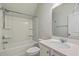 Bathroom with tub and shower combination, framed mirror and vanity with storage underneath at 420 Oak View Way, Summerville, SC 29483