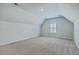 Bright bedroom features neutral walls, plush carpeting, and a window with shutter blinds for natural light at 420 Oak View Way, Summerville, SC 29483