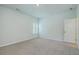 Bright bedroom features neutral walls, plush carpeting, and a window with shutter blinds for natural light at 420 Oak View Way, Summerville, SC 29483