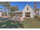 Inviting community area with an outdoor fire pit, patio seating, and a covered pavilion at 420 Oak View Way, Summerville, SC 29483