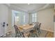 Dining room view with wood table and chairs, and modern fixtures at 420 Oak View Way, Summerville, SC 29483