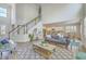 Bright and airy living space with hardwood floors, staircase, open to kitchen and dining, and comfortable seating at 420 Oak View Way, Summerville, SC 29483
