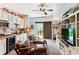 Finished basement featuring a wet bar, built-in shelving, and sliding glass door to the outside at 5394 Clairmont Ln, North Charleston, SC 29420