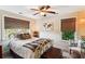 Cozy bedroom showcasing natural light, ceiling fan, and stylish decor accents at 5394 Clairmont Ln, North Charleston, SC 29420