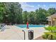 Community pool with ample seating and meticulously maintained grounds at 5394 Clairmont Ln, North Charleston, SC 29420
