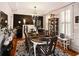 Elegant dining room with a decorative chandelier and stylish decor at 5394 Clairmont Ln, North Charleston, SC 29420