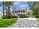 Beautiful two-story home with a lovely front porch and a circular driveway at 5394 Clairmont Ln, North Charleston, SC 29420