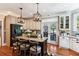 Well-equipped kitchen boasts a central island, granite countertops, modern appliances, and ample cabinet space at 5394 Clairmont Ln, North Charleston, SC 29420