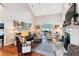 Comfortable living room with hardwood floors and a cozy fireplace at 5394 Clairmont Ln, North Charleston, SC 29420