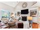 Spacious living room featuring a fireplace, built-in shelves, and an open layout perfect for entertaining at 5394 Clairmont Ln, North Charleston, SC 29420