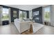 Inviting living room showcasing a modern fireplace, comfortable seating, and ample natural light at 540 Scholar Way, Summerville, SC 29486