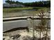 Scenic pond view with distant homes at 540 Scholar Way, Summerville, SC 29486