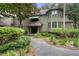 Attractive multi-story building with mature landscaping creating a welcoming, park-like setting at 5558 Green Dolphin Way, Kiawah Island, SC 29455