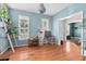 Bright bedroom with hardwood floors and a view into the hallway and another room at 578 Delafield Dr, Summerville, SC 29483