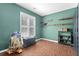 Unique bedroom with hardwood floors, shuttered windows, a fun aesthetic, and great natural light at 578 Delafield Dr, Summerville, SC 29483