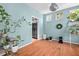 Well-lit bedroom with hardwood floors and light blue walls, perfect for a home office or den at 578 Delafield Dr, Summerville, SC 29483