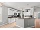 Bright kitchen features white cabinets, granite countertops, stainless steel appliances and tiled floor at 578 Delafield Dr, Summerville, SC 29483