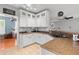 Bright eat-in kitchen features granite countertops, stainless steel appliances, white cabinets, and a tile floor at 578 Delafield Dr, Summerville, SC 29483