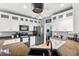 Charming kitchen featuring granite countertops, stainless steel appliances, white cabinets, and a modern sink at 578 Delafield Dr, Summerville, SC 29483