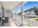Charming porch with comfortable seating area overlooking the street at 578 Delafield Dr, Summerville, SC 29483
