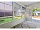 Relaxing screened porch with views of the backyard and neighboring homes at 578 Delafield Dr, Summerville, SC 29483