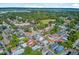 An aerial view displaying a charming neighborhood with tree-lined streets and well-maintained homes at 6 Dewey St, Charleston, SC 29403